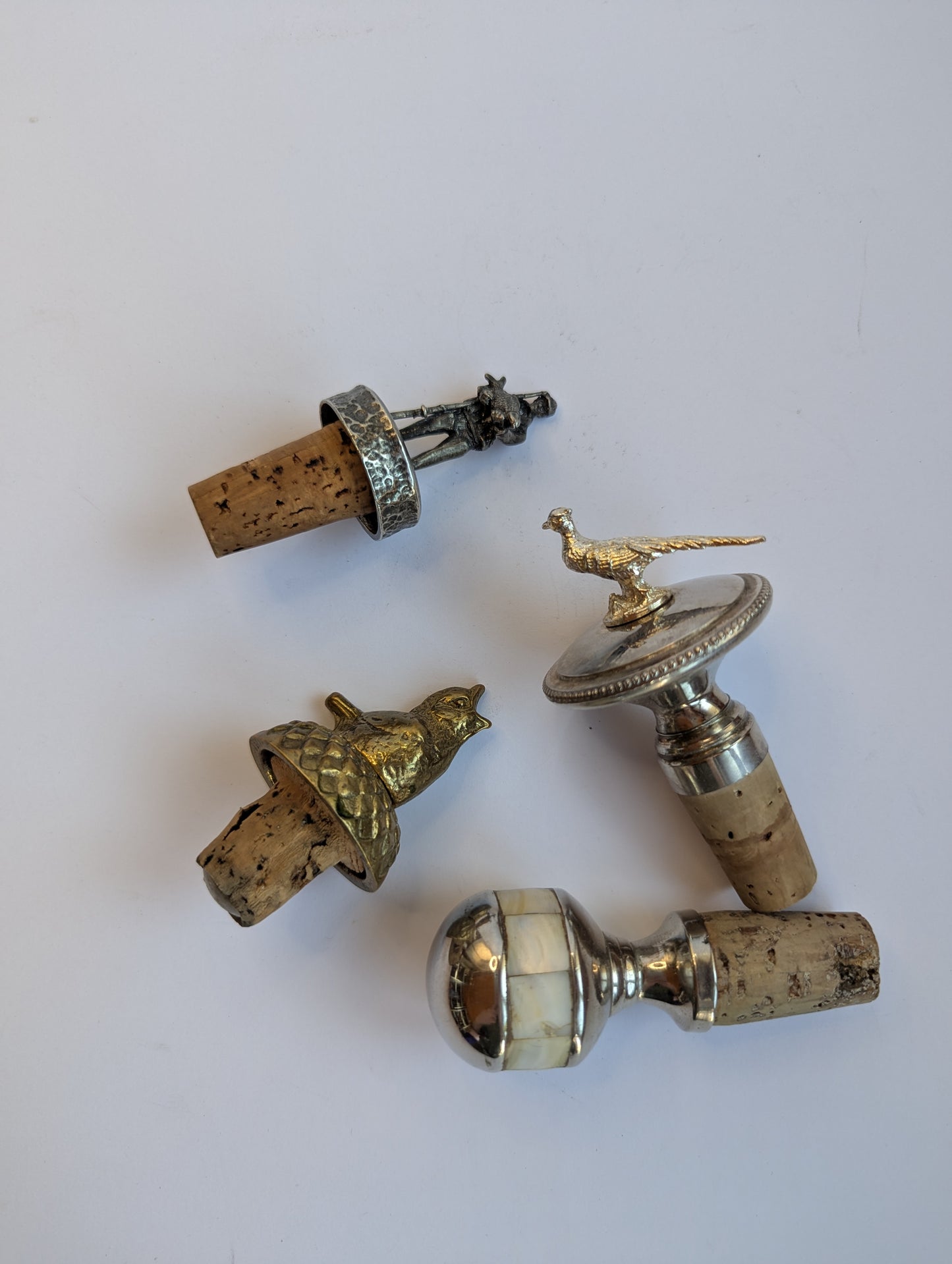 Title: Vintage Wine Bottle Stoppers – Set of 4 Ornate Mixed-Metal Cork Stoppers with Animal and Figurine Motifs